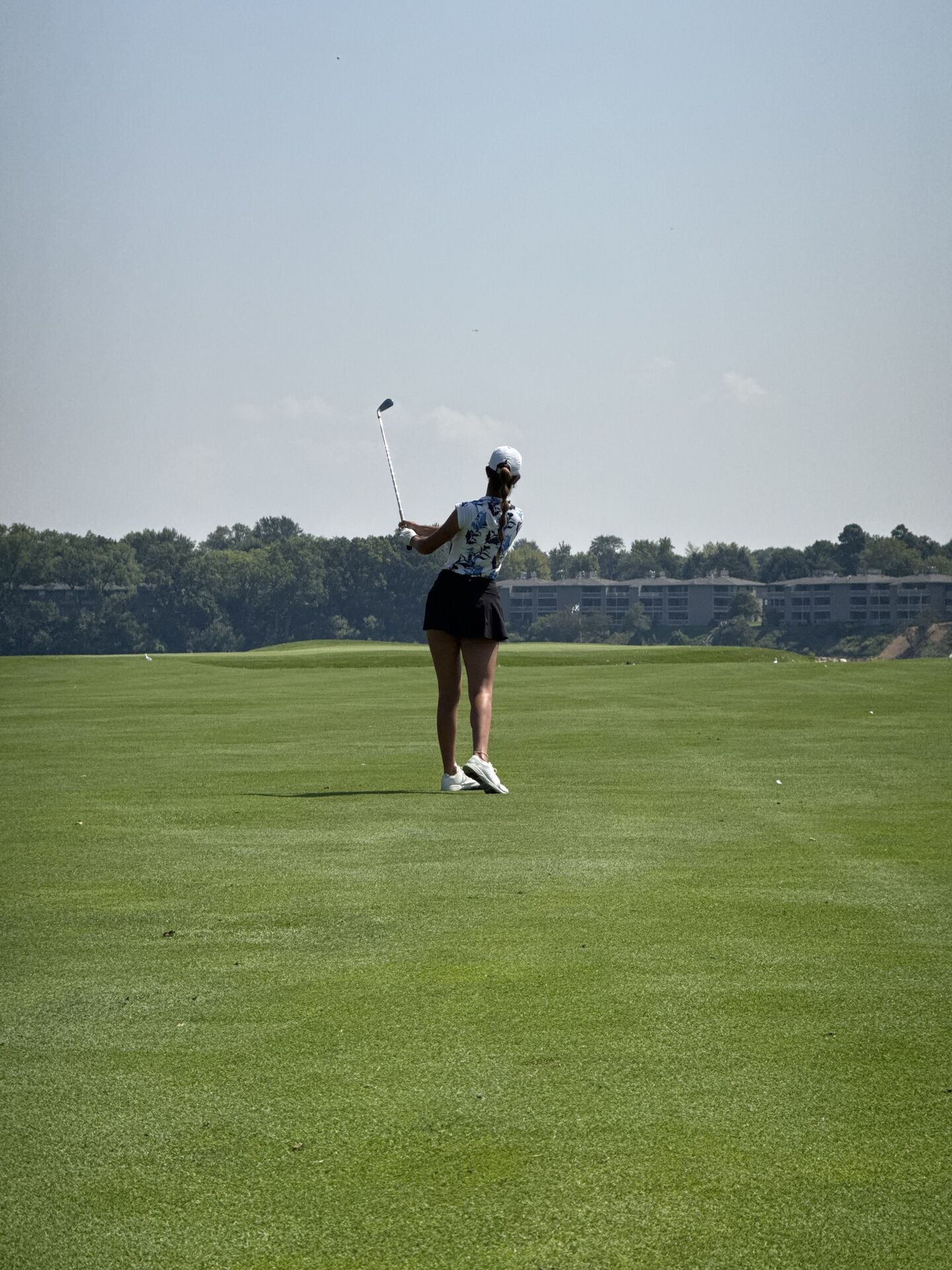 Golfer hitting an approach shot during the Great Lakes Amateur at Eagle Crest Golf Club